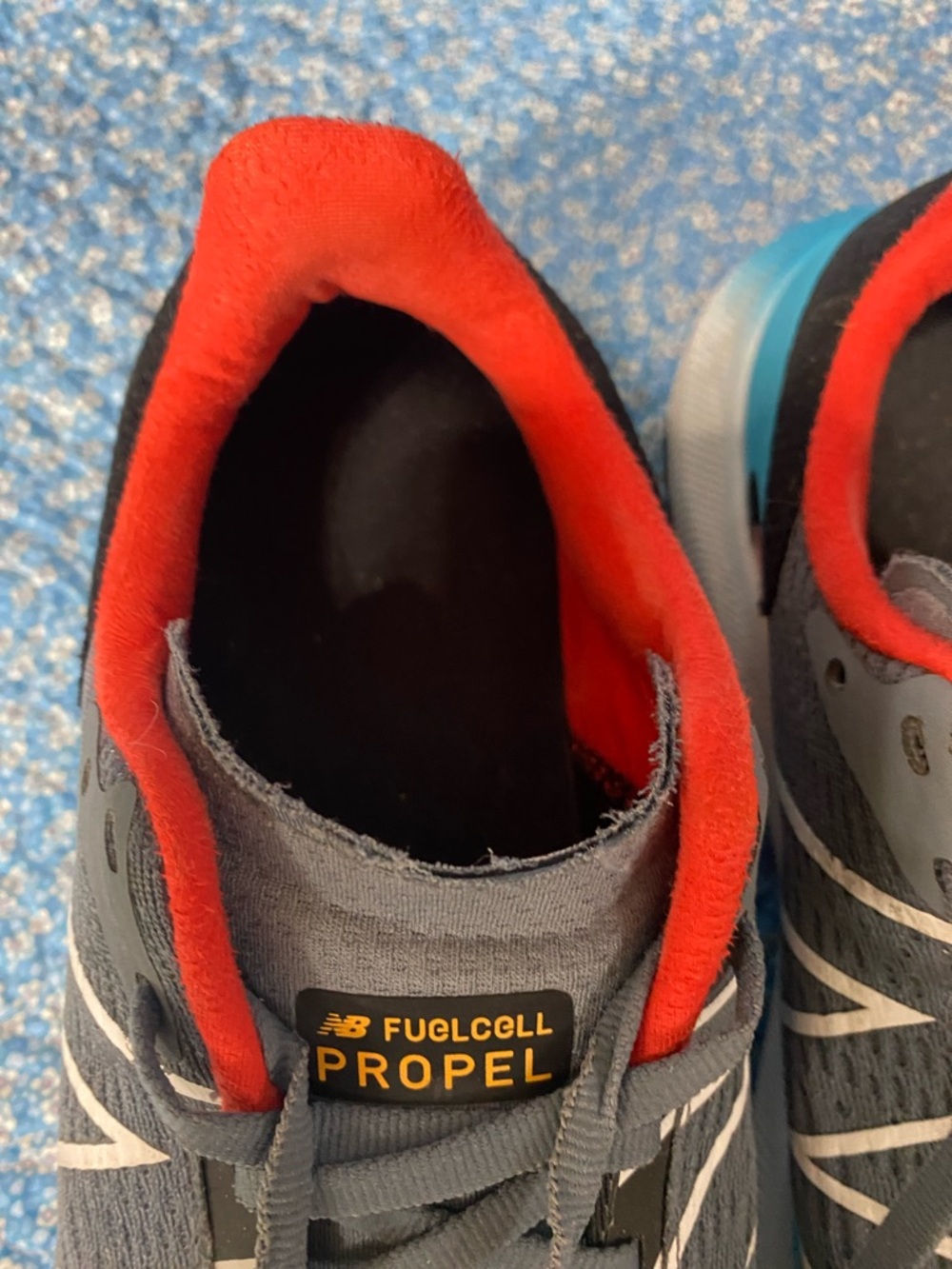 New Balance FuelCell Propel Gray Running Sneakers with Teal blue and Red Accents - Picture 9 of 10
